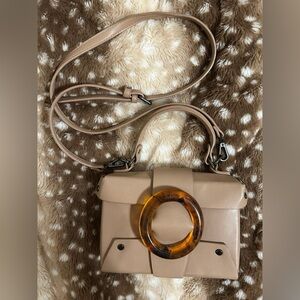 Free People “Like Dreams” boxy tortoiseshell buckle bag